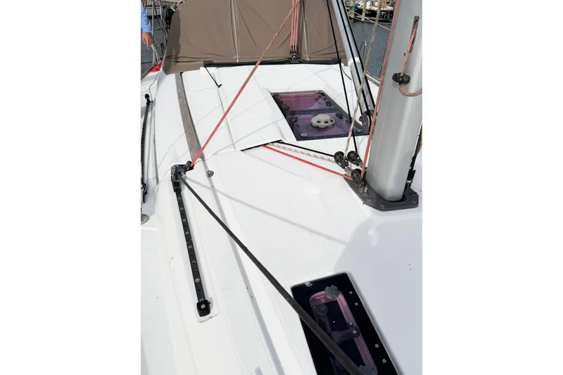 Slide: The Image of Deck view of 2013 Jeanneau Sun Odyssey 409 sailboat with rigging and hatch details. - 8