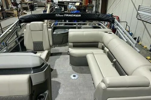 Slide: The Image of 2024 Sun Tracker Fishin' Barge 20 DLX with spacious seating and modern design. - 6