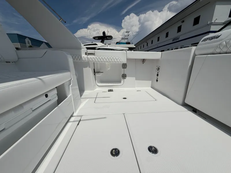 Slide: The Image of Intrepid 35 PANACEA 2026, modern boat interior, white design. - 13