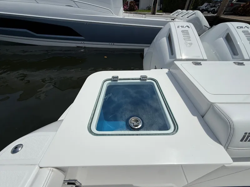 Slide: The Image of Intrepid 35 PANACEA 2026 with engines and water view. - 14