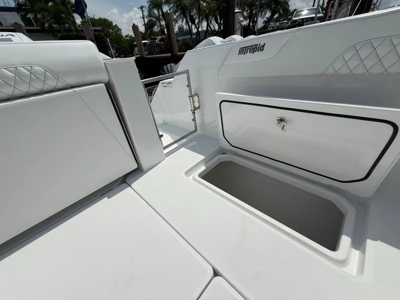 Slide: The Image of Intrepid 35 PANACEA 2026, white interior with storage compartment. - 15