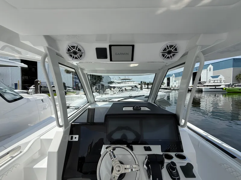 Slide: The Image of Interior view of 2026 Intrepid 35 PANACEA with modern helm console. - 23