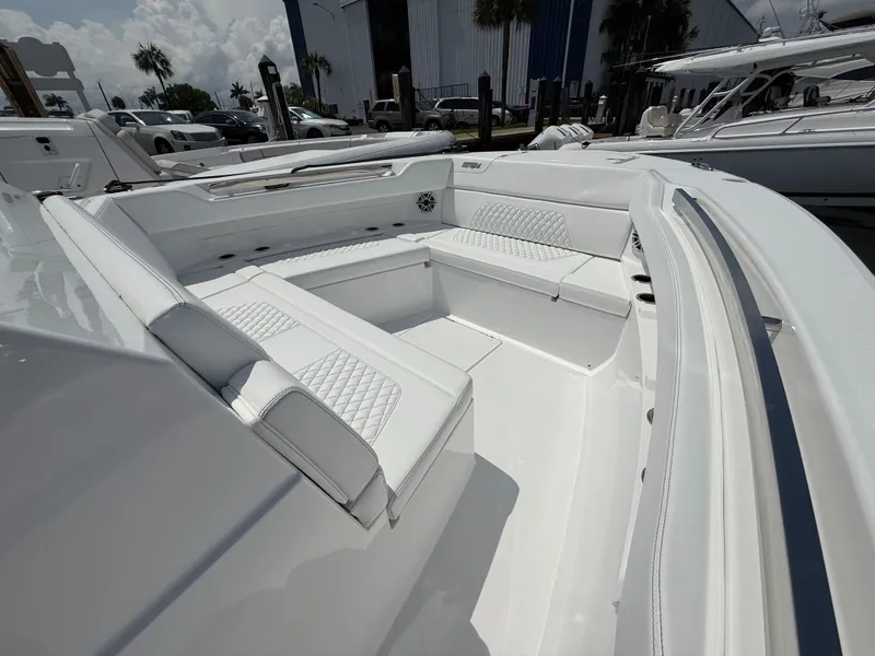 Slide: The Image of Intrepid 35 PANACEA 2026 featuring luxurious white seating area. - 25
