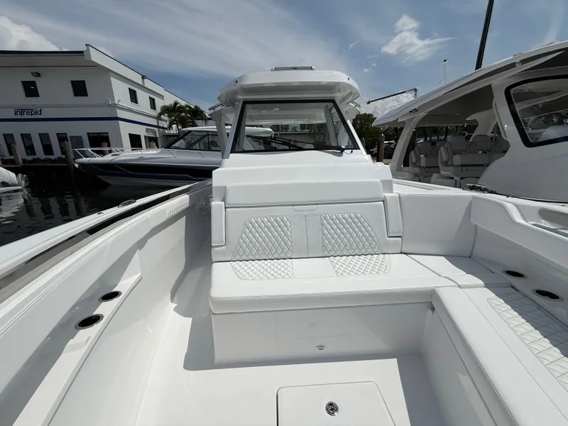 Slide: The Image of Intrepid 35 PANACEA 2026 boat with luxurious white seating area. - 26