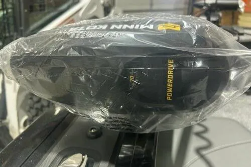 Slide: The Image of Minn Kota PowerDrive motor on 2026 Tracker Targa V-18 Combo boat, wrapped in protective plastic. - 11