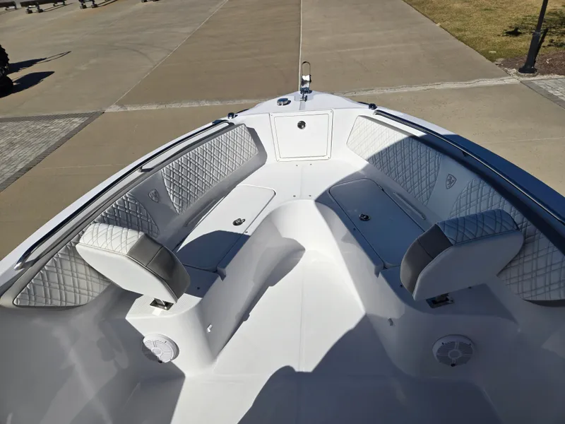 Slide: The Image of Interior view of 2024 Century 2600 boat with cushioned seating. - 11