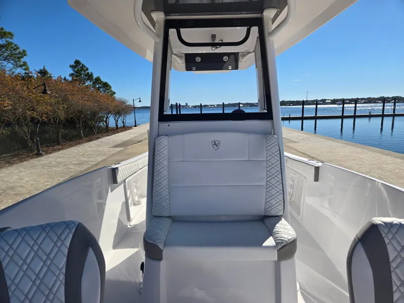 Slide: The Image of Interior view of 2024 Century 2600 boat by the water. - 12