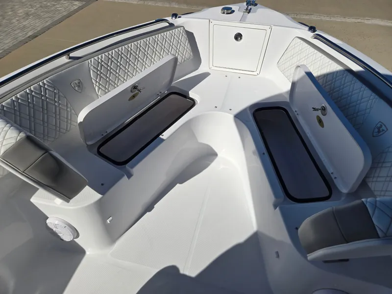 Slide: The Image of Interior of 2024 Century 2600 boat with cushioned seating. - 13