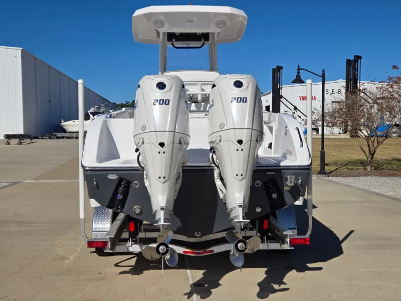 Slide: The Image of 2024 Century 2600 boat with dual outboard engines. - 4