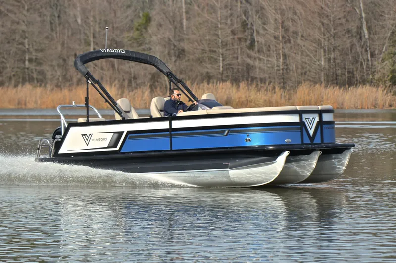 The Image of 2022 Viaggio Diamante Q pontoon boat cruising on a calm lake. - 1