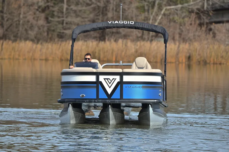 Slide: The Image of 2022 Viaggio Diamante Q pontoon boat on a calm lake. - 11