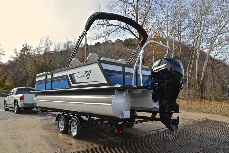 Slide: The Image of 2022 Viaggio Diamante Q pontoon boat on trailer with Mercury outboard motor. - 14