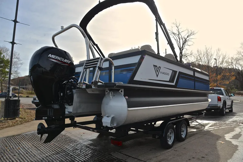 Slide: The Image of 2022 Viaggio Diamante Q pontoon boat on trailer with Mercury outboard motor. - 16