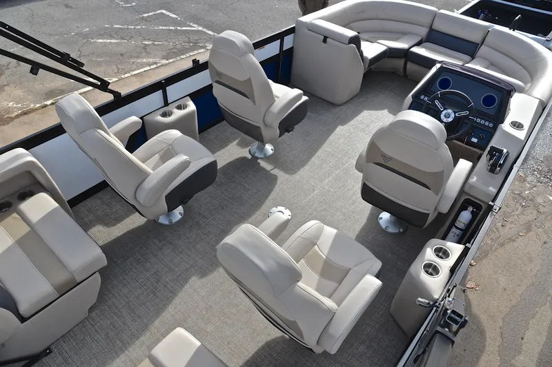 Slide: The Image of 2022 Viaggio Diamante Q boat interior with luxurious seating and modern dashboard. - 21