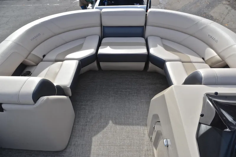 Slide: The Image of Luxurious seating on 2022 Viaggio Diamante Q boat, featuring elegant beige and gray upholstery. - 24