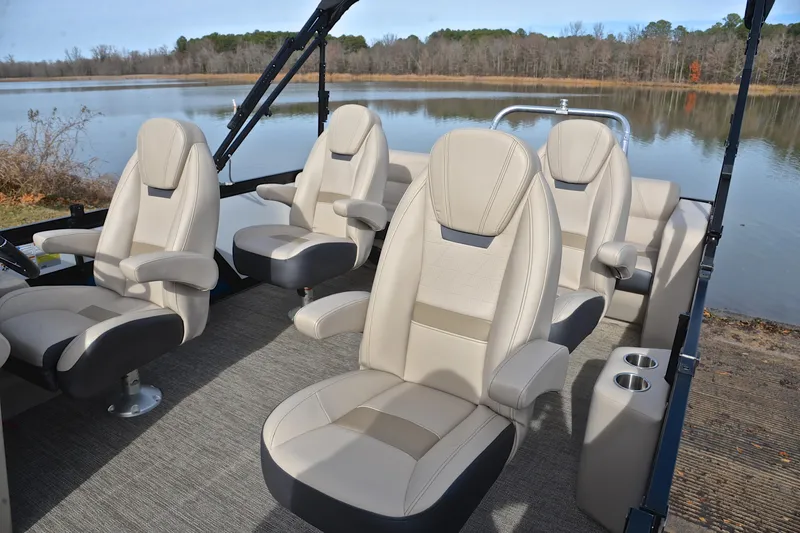 Slide: The Image of Luxurious seating on 2022 Viaggio Diamante Q boat, overlooking serene lake. - 25