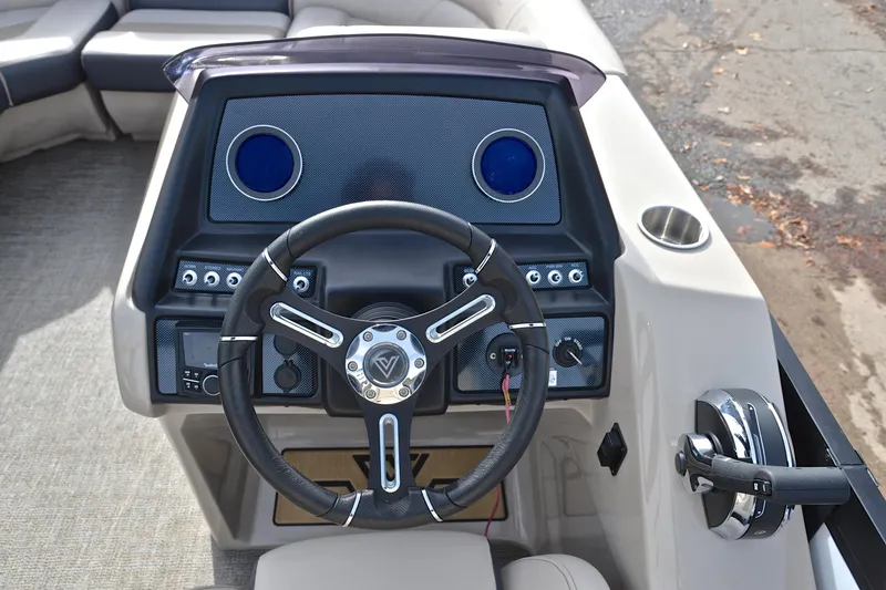 Slide: The Image of Steering console of 2022 Viaggio Diamante Q boat with modern controls and cup holder. - 28