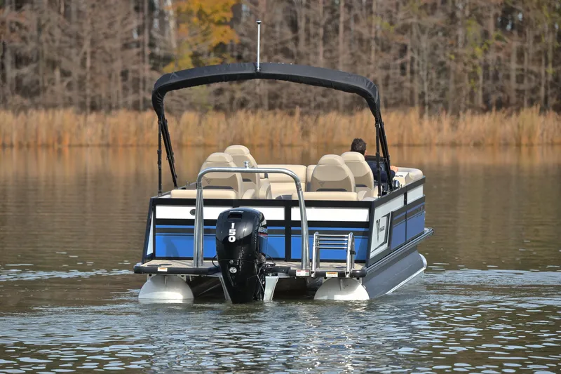 Slide: The Image of 2022 Viaggio Diamante Q pontoon boat cruising on a calm lake. - 9