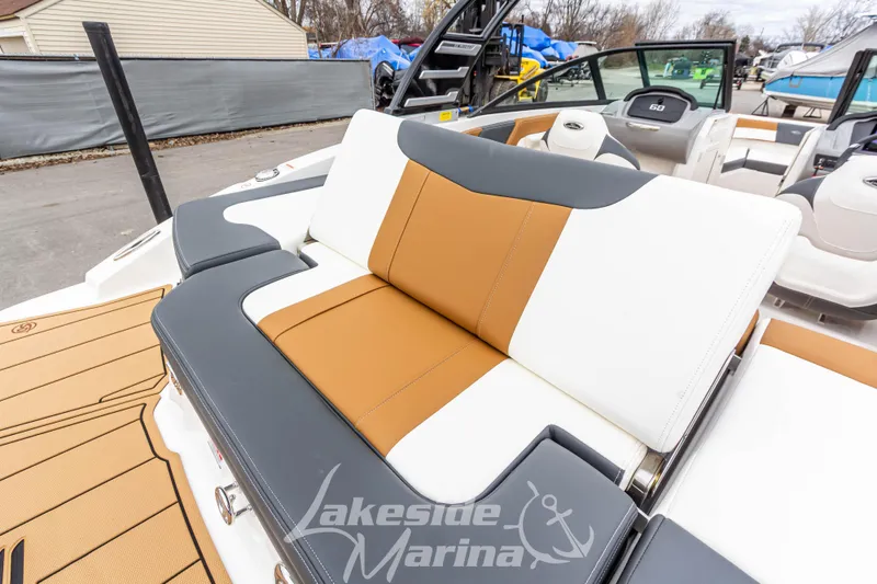 Slide: The Image of 2025 Chaparral 21 SSi boat interior with stylish seating at Lakeside Marina. - 11