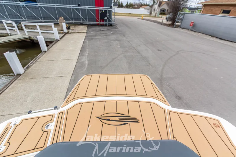 Slide: The Image of 2025 Chaparral 21 SSi boat at Lakeside Marina dockside view. - 12