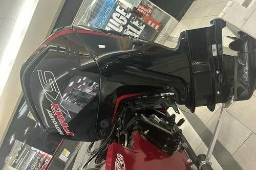 Slide: The Image of 2025 Tracker Pro Guide V-175 Combo boat engine in showroom display. - 5