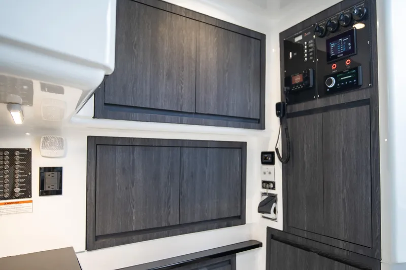 Slide: The Image of Interior of 2025 Cigarette 41 Nighthawk with modern control panels and cabinetry. - 13