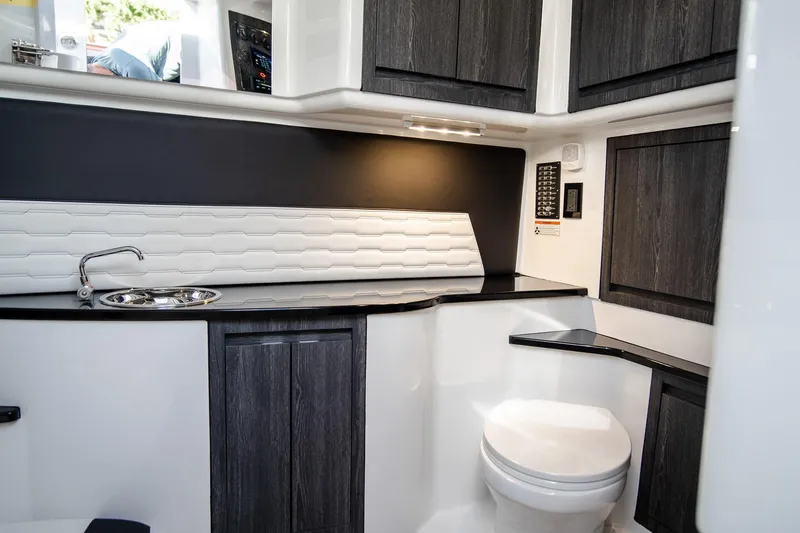 Slide: The Image of Luxurious interior of 2025 Cigarette 41 Nighthawk boat featuring modern bathroom design. - 16
