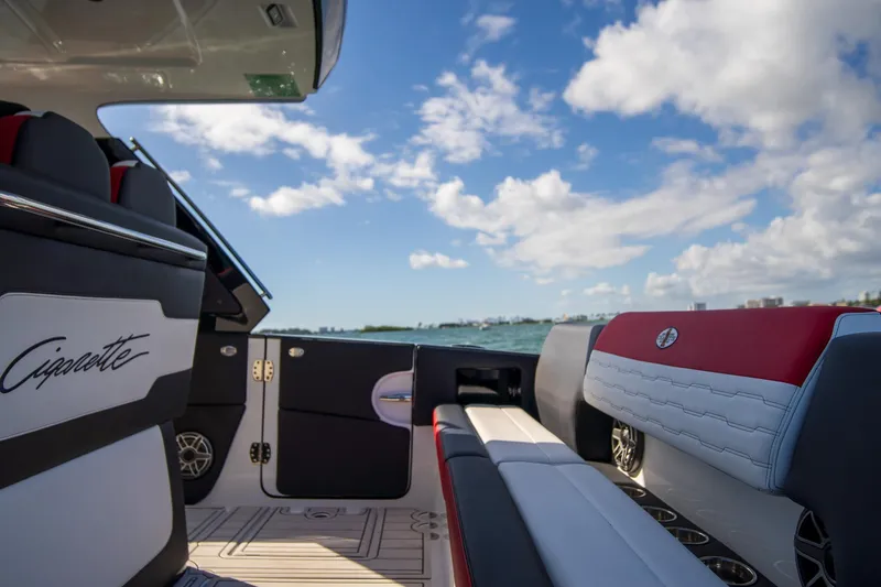 Slide: The Image of 2025 Cigarette 41 Nighthawk boat interior with luxury seating and ocean view. - 21
