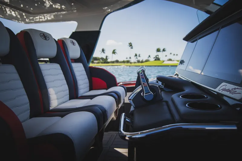 Slide: The Image of Interior of 2025 Cigarette 41 Nighthawk boat with luxury seating and control panel. - 34