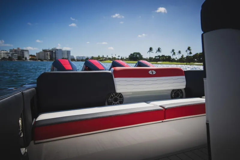 Slide: The Image of 2025 Cigarette 41 Nighthawk boat interior with red and white seating, ocean view. - 35