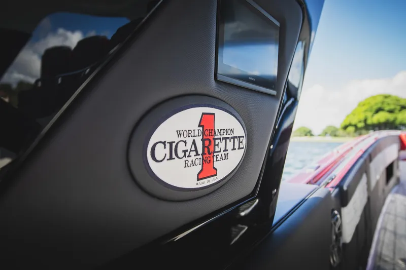 Slide: The Image of 2025 Cigarette 41 Nighthawk boat with racing team logo on display. - 37