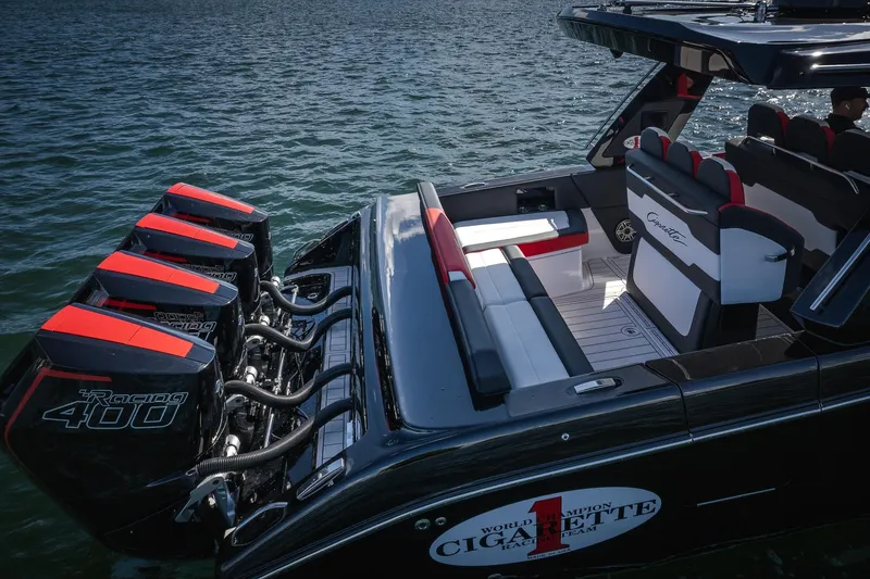 Slide: The Image of 2025 Cigarette 41 Nighthawk boat with quad Racing 400 engines on water. - 45
