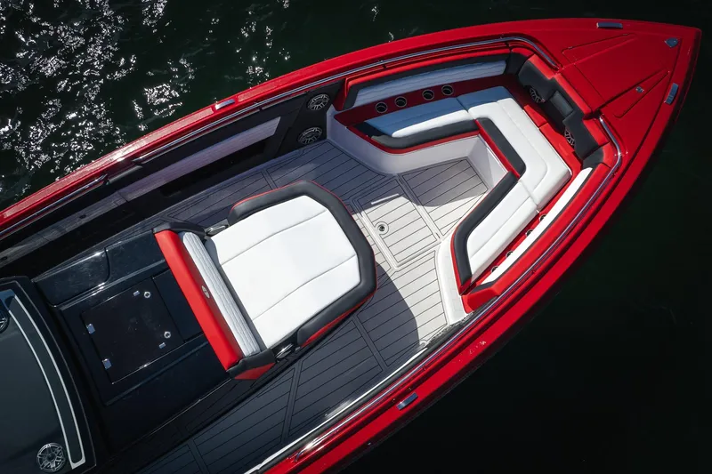 Slide: The Image of 2025 Cigarette 41 Nighthawk boat with sleek red and white interior design. - 48