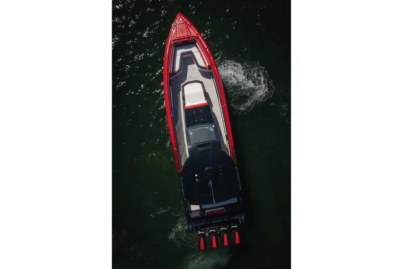 Slide: The Image of Aerial view of 2025 Cigarette 41 Nighthawk boat on water. - 59