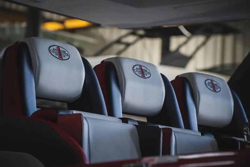 Slide: The Image of Luxury seating in 2025 Cigarette 41 Nighthawk boat, featuring branded headrests. - 73