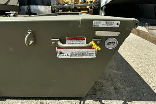 Slide: The Image of 2025 Tracker Grizzly 14 Jon boat, side view with labels and handle. - 3