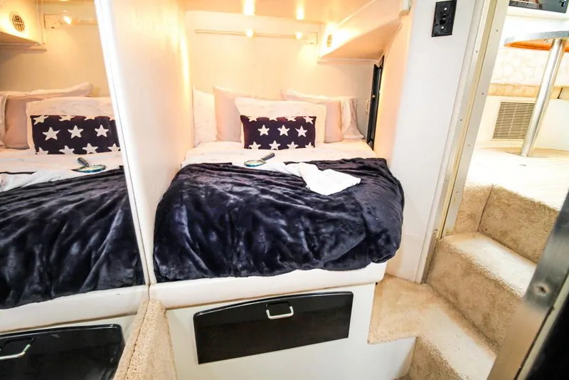 Slide: The Image of Cozy 1988 Californian Veneti bedroom with plush bedding and star-patterned pillows. - 27