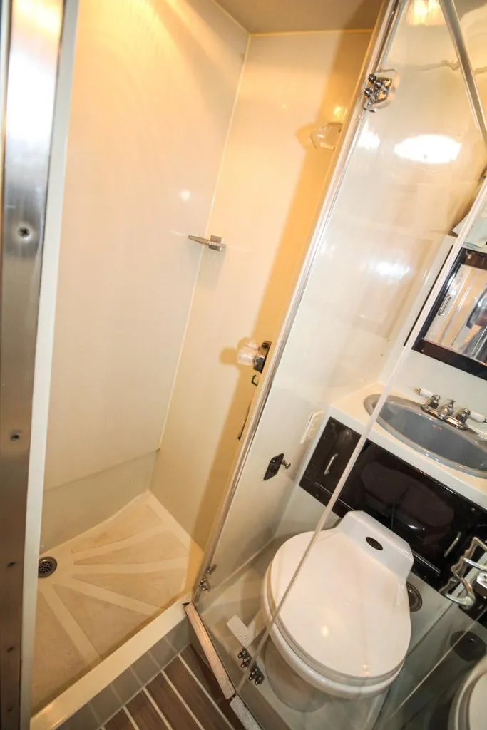 Slide: The Image of 1988 Californian Veneti bathroom with shower, toilet, and sink in compact layout. - 32