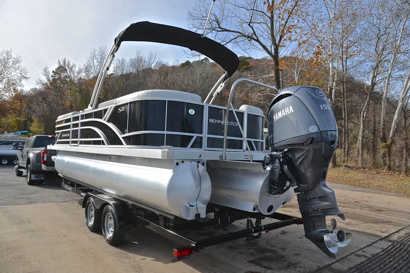 Slide: The Image of 2025 Bennington 22 S pontoon boat with Yamaha 150 engine on trailer. - 12