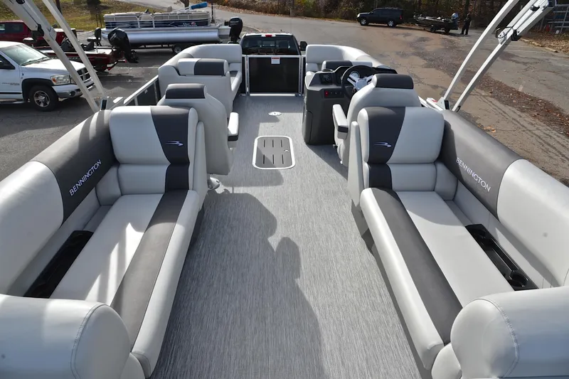 Slide: The Image of 2025 Bennington 22 S pontoon boat interior with spacious seating and modern design. - 18