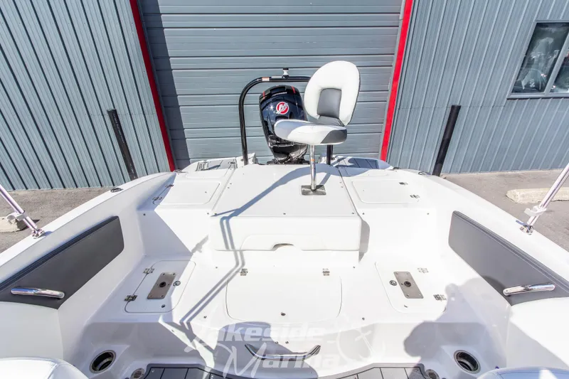 Slide: The Image of 2025 Chaparral 21 SSi Ski & Fish OB boat interior with seating and storage compartments. - 17