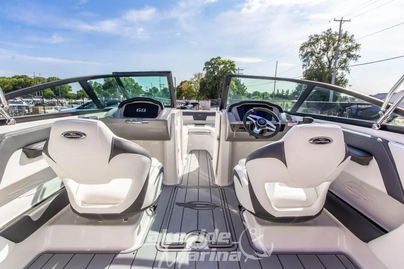 Slide: The Image of 2025 Chaparral 21 SSi Ski & Fish OB interior with dual seats and modern dashboard. - 18