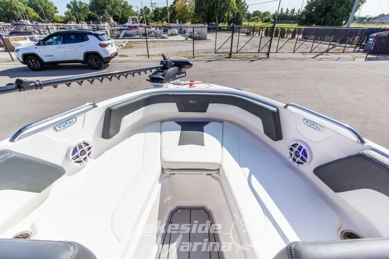 Slide: The Image of 2025 Chaparral 21 SSi Ski & Fish OB boat interior with seating and speakers. - 28