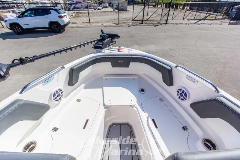 Slide: The Image of 2025 Chaparral 21 SSi Ski & Fish OB boat interior with seating and speakers. - 29