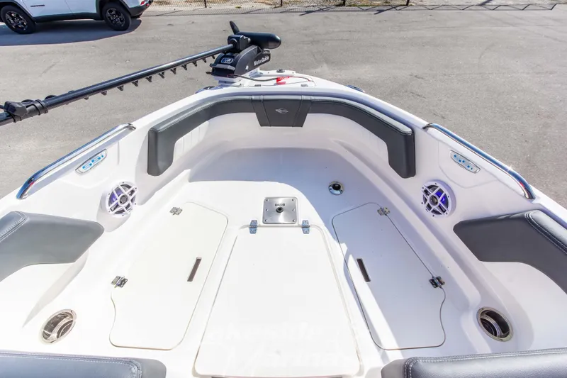 Slide: The Image of 2025 Chaparral 21 SSi Ski & Fish OB boat interior with seating and storage compartments. - 30