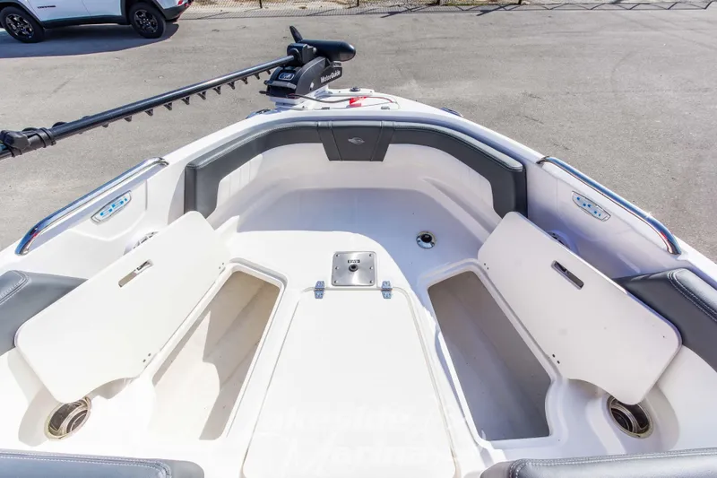 Slide: The Image of 2025 Chaparral 21 SSi Ski & Fish OB boat interior with storage compartments open. - 31