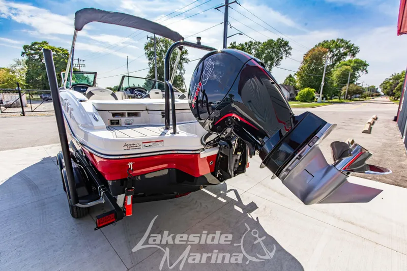Slide: The Image of 2025 Chaparral 21 SSi Ski & Fish OB boat with powerful outboard motor at Lakeside Marina. - 5