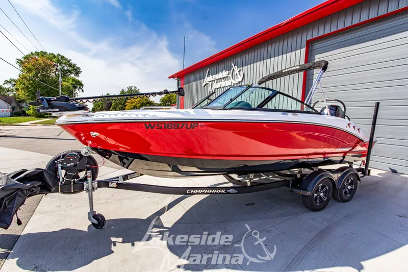 Slide: The Image of 2025 Chaparral 21 SSi Ski & Fish OB boat in vibrant red at Lakeside Marina. - 8