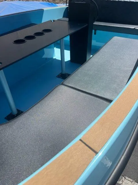 Slide: The Image of 2023 Vision Marine Technologies Volt 180 interior with sleek seating and modern design. - 4