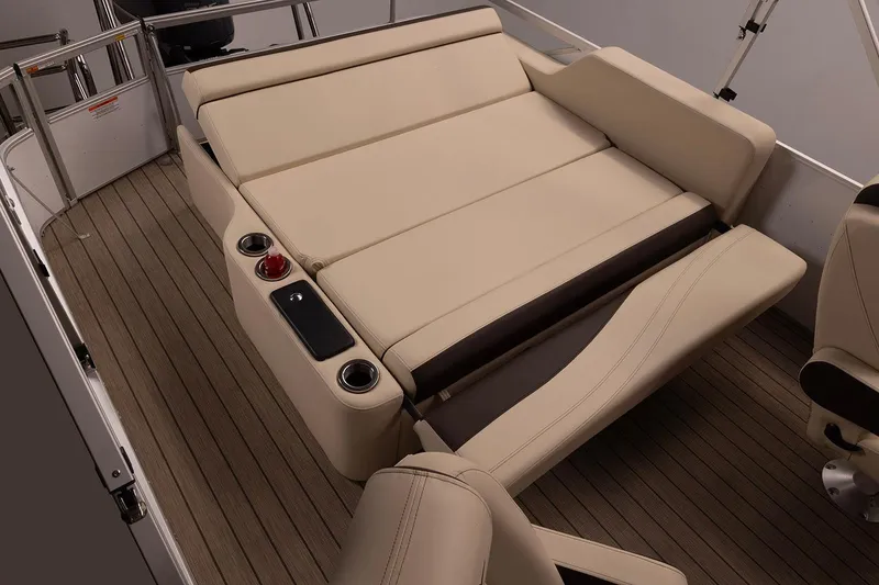 Slide: The Image of Manufacturer Provided Image: Luxurious seating on 2026 SunCatcher Fusion 324SL boat, featuring beige upholstery and cup holders. - 14